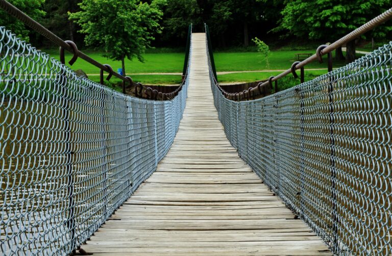 Transition represented by a swinging bridge